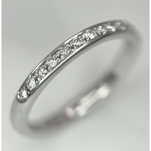 284 - A 14K WHITE GOLD DIAMOND BAND RING 2.3G TOTAL WEIGHT, SIZE J.

ref: SC 1071