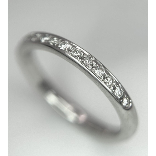 284 - A 14K WHITE GOLD DIAMOND BAND RING 2.3G TOTAL WEIGHT, SIZE J.

ref: SC 1071