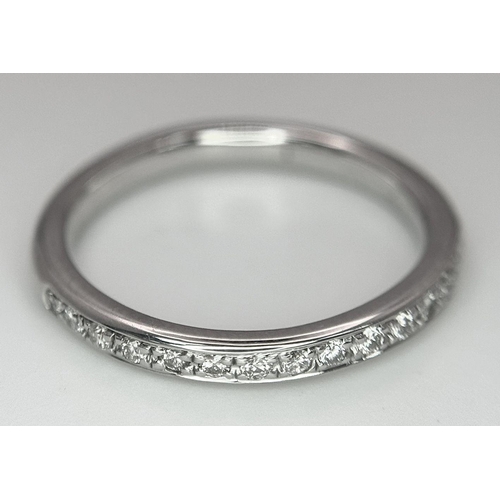 284 - A 14K WHITE GOLD DIAMOND BAND RING 2.3G TOTAL WEIGHT, SIZE J.

ref: SC 1071