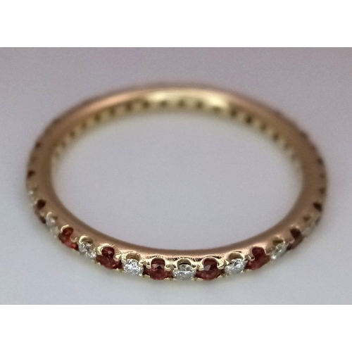 291 - A 14K YELLOW GOLD ( TESTED ) DIAMOND & RUBY FULL ETERNITY BAND RING 1.7G TOTAL WEIGHT, SIZE N.

ref:... 