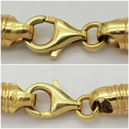 74 - AN 18K GOLD INTERLINK TWIST BRACELET WITH LOBSTER CLASP  .   8.1gms     20cms