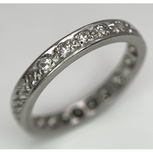 145 - AN 18K WHITE GOLD DIAMOND SET FULL ET RING 3.4G TOTAL WEIGHT, SIZE M, 0.25CT.

ref: SC 1085