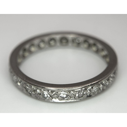 145 - AN 18K WHITE GOLD DIAMOND SET FULL ET RING 3.4G TOTAL WEIGHT, SIZE M, 0.25CT.

ref: SC 1085