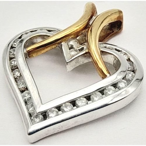 306 - A 9K 2 COLOUR GOLD DIAMOND SET OPEN HEART PENDANT 3.2G , 21MM X 17MM.

REF: SC 1026