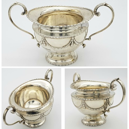 23 - A Regency Style Robert F Mosley Four Piece Tea Set. Hallmarks for Sheffield 1913. Total weight of 19... 