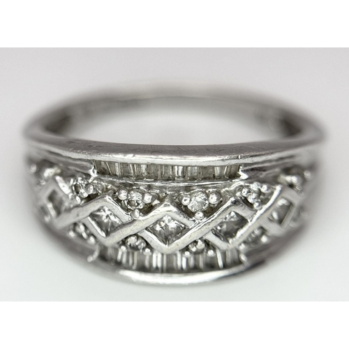 194 - A 9K WHITE GOLD DIAMOND SET RING 4.3G TOTAL WEIGHT, SIZE T.

ref: SC 1111