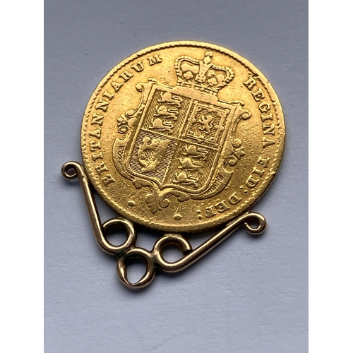 105 - 1855 SHIELD HALF SOVEREIGN. Gold Mounted to top. Young Victoria head. Very fine condition.