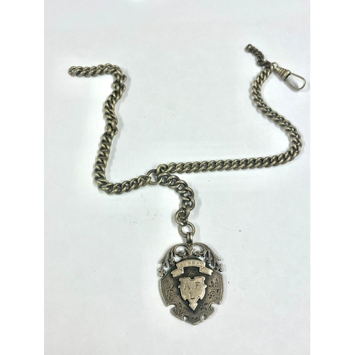 169 - A Pocket watch chain with silver fob ( Bombay ).