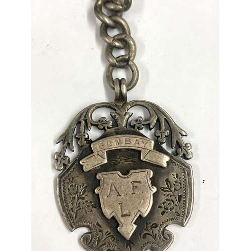 169 - A Pocket watch chain with silver fob ( Bombay ).