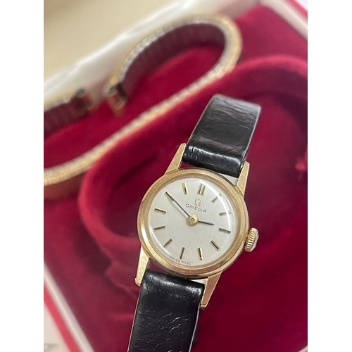 40 - A 9ct gold ladies omega with box etc. Sold as found.