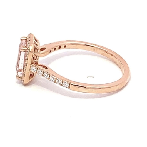 186 - A 18ct Rose Gold MORGANITE and DIAMOND Halo Ring. 0.94ct claw set emerald shape Morganite  centre, d... 