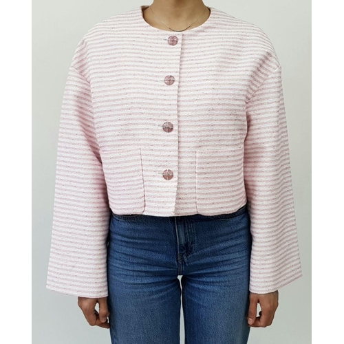 10 - A Chanel Pink and White Striped Cropped Jacket. Cotton, polyamide, and wool blend exterior with silv... 