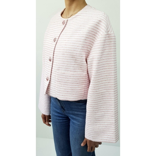 10 - A Chanel Pink and White Striped Cropped Jacket. Cotton, polyamide, and wool blend exterior with silv... 