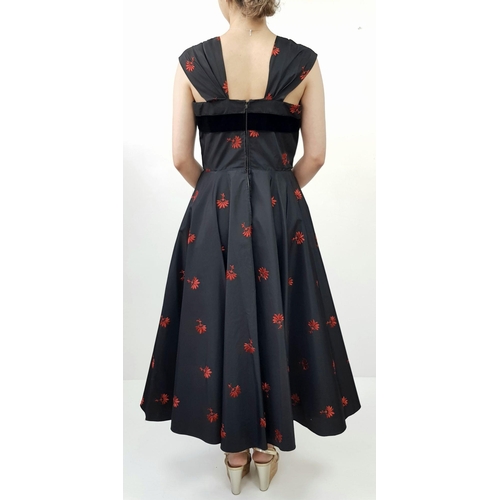 134 - A stunning 1950's style rockabilly dress by Robert Dorland, styled for Bourne and Hollingsworth. Two... 