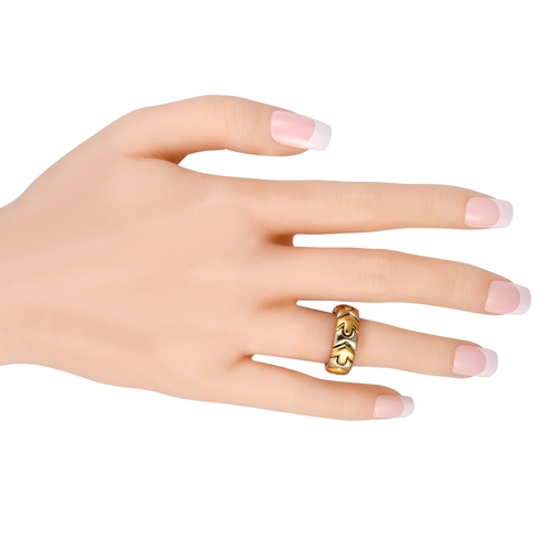 134 - WITHDRAWN A Bvlgari Alveare 18K Yellow Gold and Steel Ring. A finely crafted geometric ring from Bvl... 