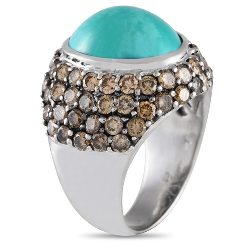 267 - A 18K White Gold 3.26ct Diamond and Turquoise Cocktail Ring. The ring has a white gold band with 3.2... 