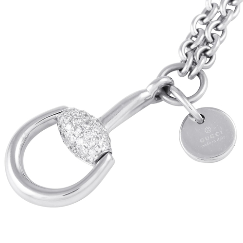 58 - A Gucci Horsebit 18K White Gold 0.40ct Diamond Necklace. This Gucci Horsebit necklace brings one of ... 