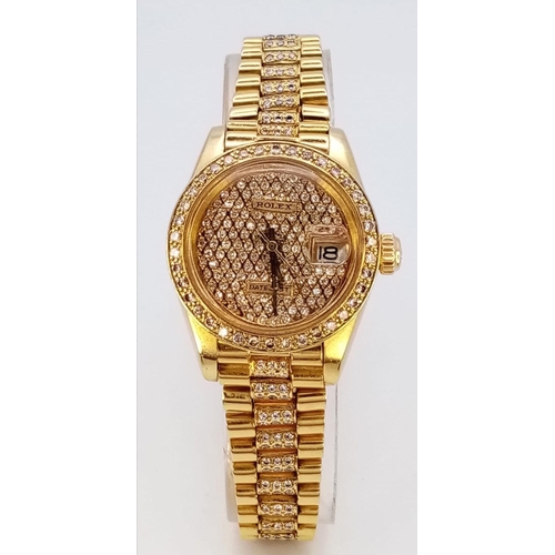 118 - A stunning 18 K yellow gold, ladies ROLEX watch with pave diamonds on bezel, dial and bracelet, case... 