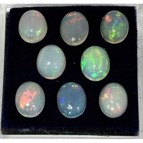 153 - Eight top quality, Australian opal, large (10 x 8 mm) cabochons, with excellent chatoyance. No scrat... 