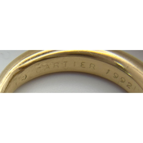 19 - An 18K Yellow Gold Cartier Ellipse Sapphire Band Ring. Size N. 9.2g total weight. Comes with origina... 