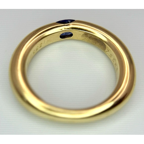 19 - An 18K Yellow Gold Cartier Ellipse Sapphire Band Ring. Size N. 9.2g total weight. Comes with origina... 