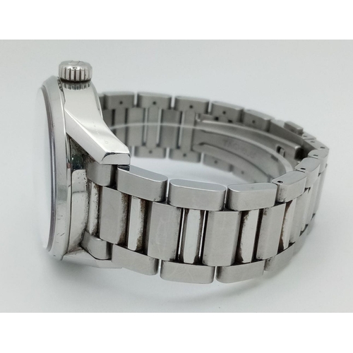 247 - A Tag Heuer Carrera Automatic Gents Watch. Stainless steel bracelet and case - 41mm. Black dial with... 