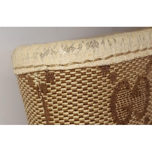 250 - A Gucci Brown/Beige Eclipse Tote Bag. Textile exterior with leather trim, gold-toned hardware, four ... 
