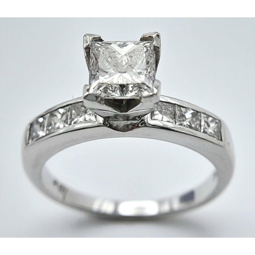 33 - An 18K White Gold and Diamond Bridal Ring Set. A Princess cut 0.55ct, near white (centre stone) diam... 