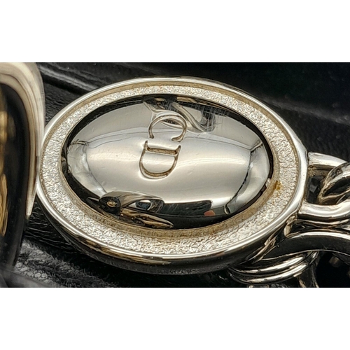 43 - A Christian Dior Black Lady Dior Handbag. Leather exterior with silver-toned hardware, stud embellis... 