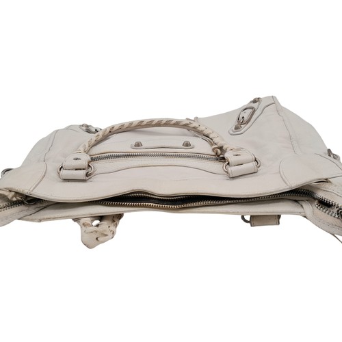 158 - A Balenciaga cream city leather handbag, silver tone hardware, black cloth interior with zip pocket,... 