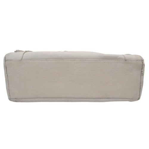 158 - A Balenciaga cream city leather handbag, silver tone hardware, black cloth interior with zip pocket,... 