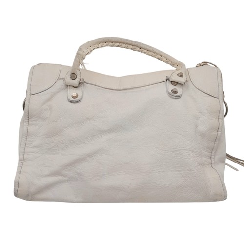 158 - A Balenciaga cream city leather handbag, silver tone hardware, black cloth interior with zip pocket,... 