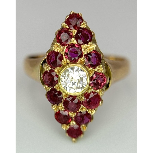 512 - A 14K Yellow Gold Ruby and Diamond Ring. Central diamond surrounded by 15 rubies in a marquise shape... 