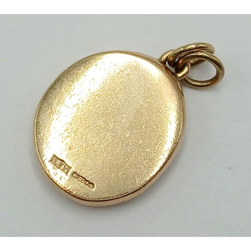 59 - A Vintage 9K Yellow Gold Egyptian Themed Pendant. 3cm. 8.4g weight.