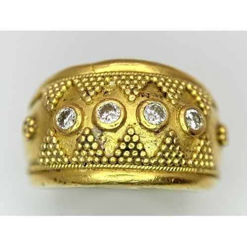 61 - A 22K Yellow Gold Four Stone Diamond Ring. Etruscan style wide band ring with beaded geometric decor... 