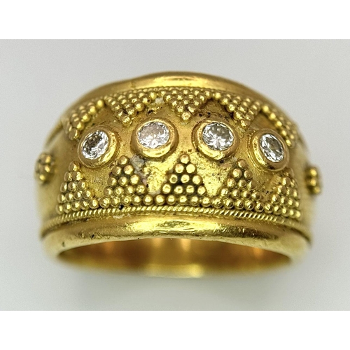 61 - A 22K Yellow Gold Four Stone Diamond Ring. Etruscan style wide band ring with beaded geometric decor... 