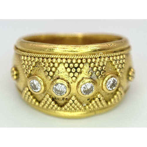 61 - A 22K Yellow Gold Four Stone Diamond Ring. Etruscan style wide band ring with beaded geometric decor... 