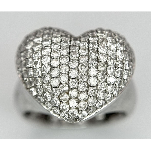 68 - An 18K White Gold Diamond Pave Heart Ring. 1.2ctw of pave round cut diamonds in heart form. Size H (... 