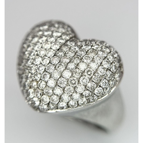 68 - An 18K White Gold Diamond Pave Heart Ring. 1.2ctw of pave round cut diamonds in heart form. Size H (... 