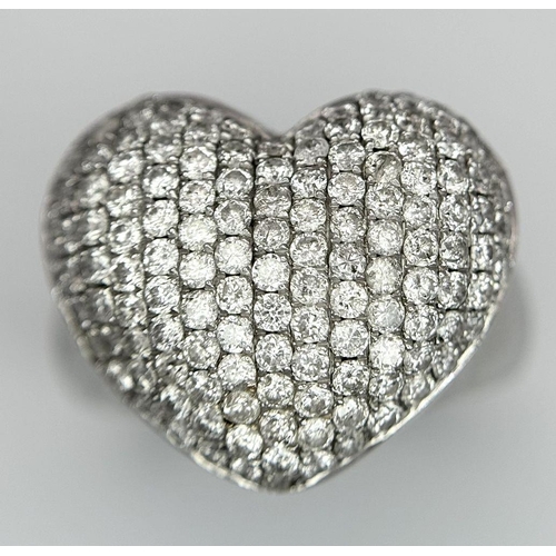 68 - An 18K White Gold Diamond Pave Heart Ring. 1.2ctw of pave round cut diamonds in heart form. Size H (... 