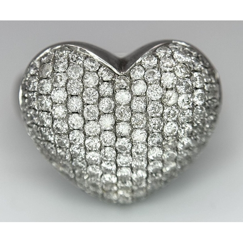 68 - An 18K White Gold Diamond Pave Heart Ring. 1.2ctw of pave round cut diamonds in heart form. Size H (... 