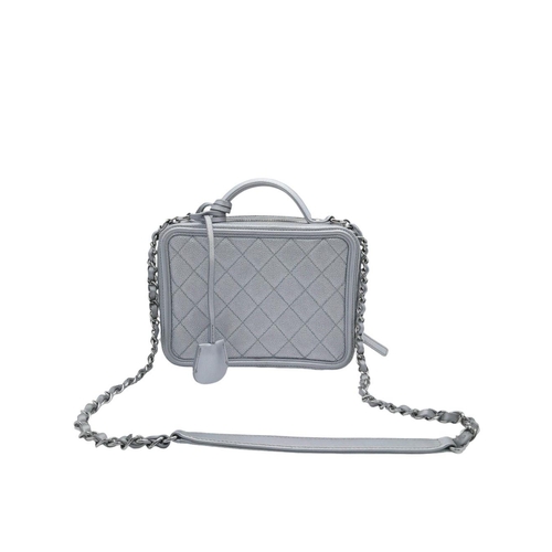 8 - A Chanel silver metallic caviar quilted medium CC vanity case bag, silver hardware, comes with lock ... 