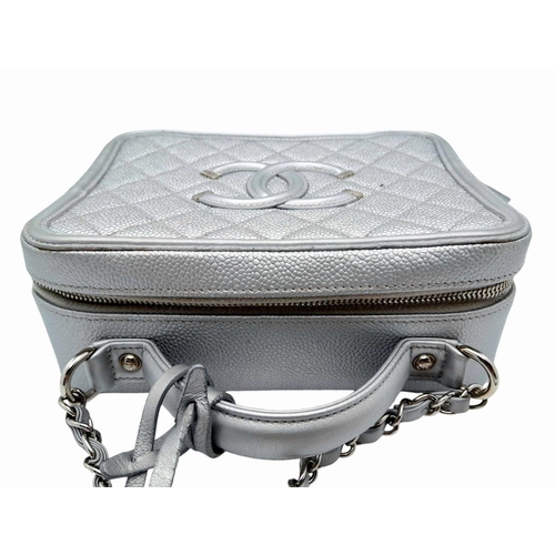 8 - A Chanel silver metallic caviar quilted medium CC vanity case bag, silver hardware, comes with lock ... 