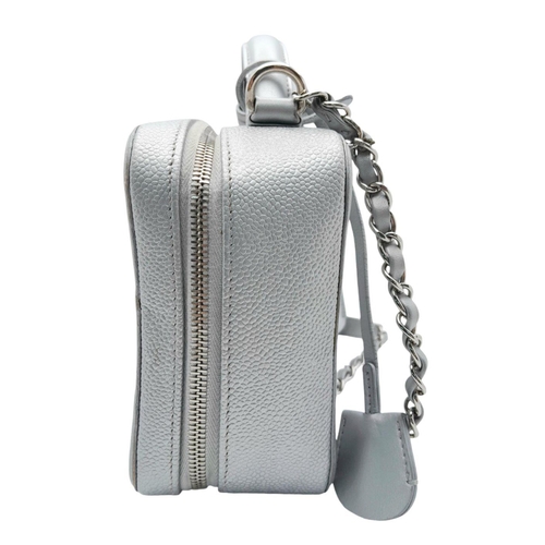 8 - A Chanel silver metallic caviar quilted medium CC vanity case bag, silver hardware, comes with lock ... 