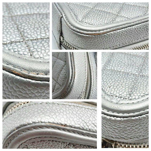 8 - A Chanel silver metallic caviar quilted medium CC vanity case bag, silver hardware, comes with lock ... 