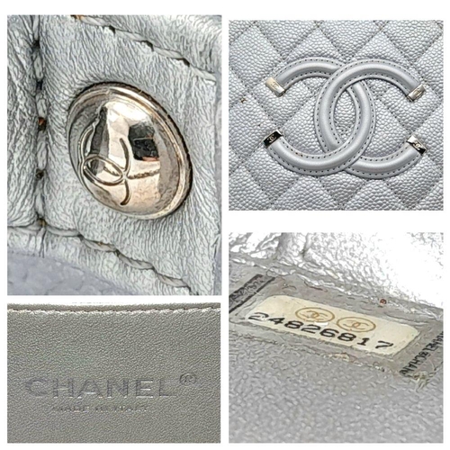 8 - A Chanel silver metallic caviar quilted medium CC vanity case bag, silver hardware, comes with lock ... 