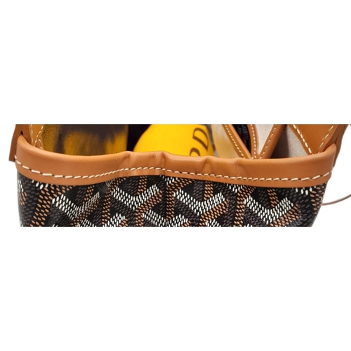 85 - A Goyard Brown Bellechasse Bag. Coated canvas exterior with leather trim, two leather straps and sec... 