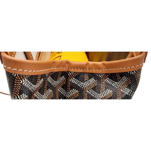 85 - A Goyard Brown Bellechasse Bag. Coated canvas exterior with leather trim, two leather straps and sec... 