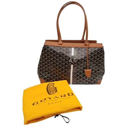 85 - A Goyard Brown Bellechasse Bag. Coated canvas exterior with leather trim, two leather straps and sec... 