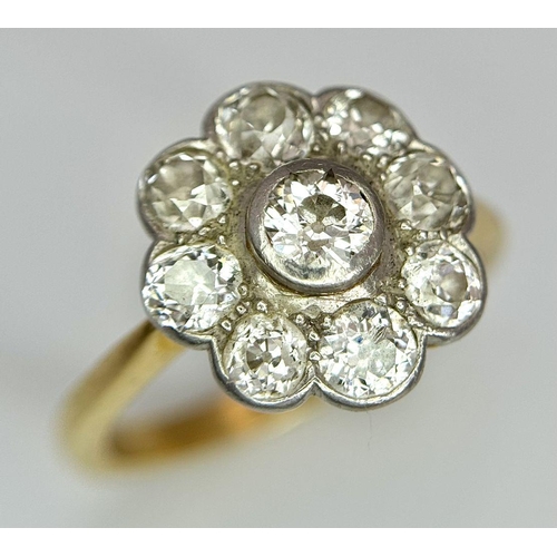 89 - An Antique 18K Yellow Gold (Tested) Diamond Ring in Floral Form. Nine round cut diamonds of 1.6ctw c... 